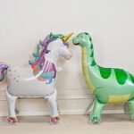 Self-standing green dinosaur walking foil balloon with wheels—perfect for kids' birthday parties and jungle-themed decorations! - Image 3